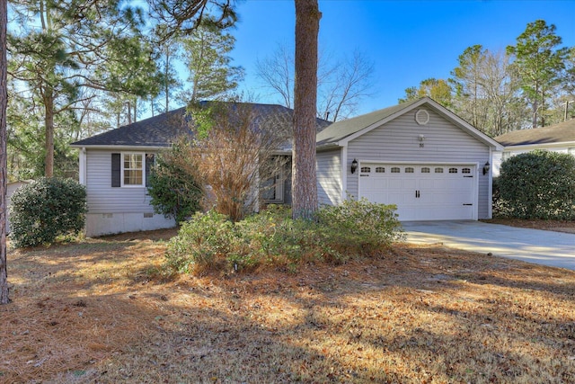 single story home featuring a garage