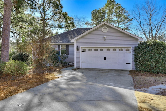 single story home with a garage