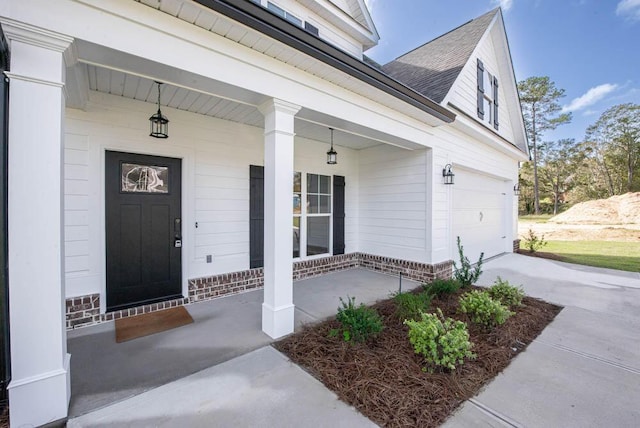 entrance to property with covered porch