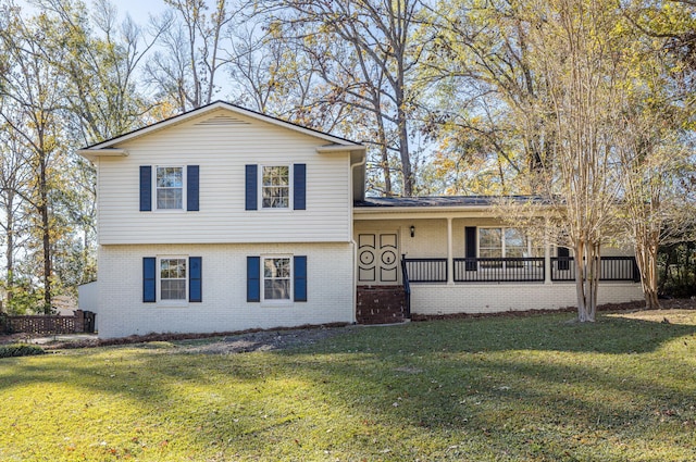 view of front of property with a front lawn