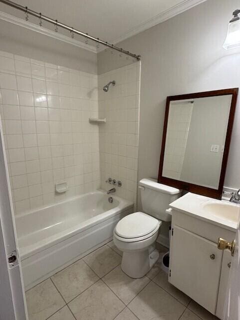 bathroom with ornamental molding, tile patterned flooring, bathing tub / shower combination, and vanity