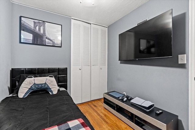 3318 Forest Estates Dr, Augusta, GA 30909 - bedroom with wood finished floors and a closet