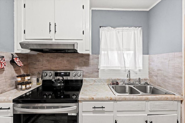 3318 Forest Estates Dr, Augusta, GA 30909 - kitchen with stainless steel electric stove, ventilation hood, a sink, white cabinetry, and light countertops
