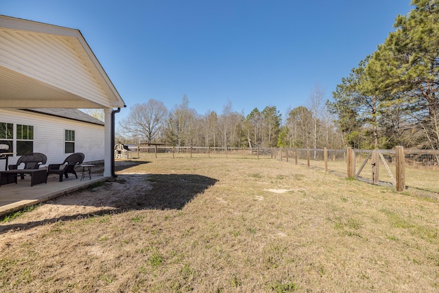 view of yard with a patio area and fence