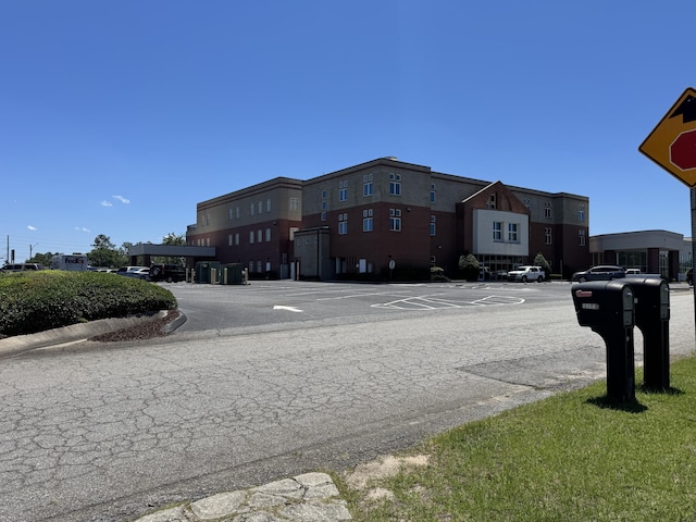 3909 Roberts Rd, Augusta, GA 30907 - view of asphalt road featuring curbs