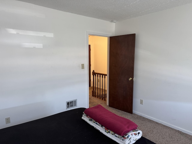 3909 Roberts Rd, Augusta, GA 30907 - bedroom featuring carpet floors and a textured ceiling