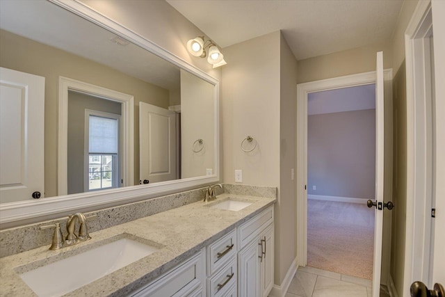 bathroom featuring vanity and tile patterned flooring