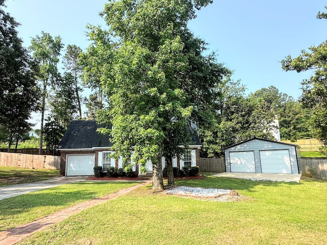 4917 Cavan Pl, Grovetown, GA 30813 - view of front of house with brick siding, an outbuilding, and a detached garage