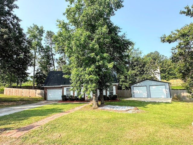 4917 Cavan Pl, Grovetown, GA 30813 - view of front of house with a garage, an outdoor structure, and driveway