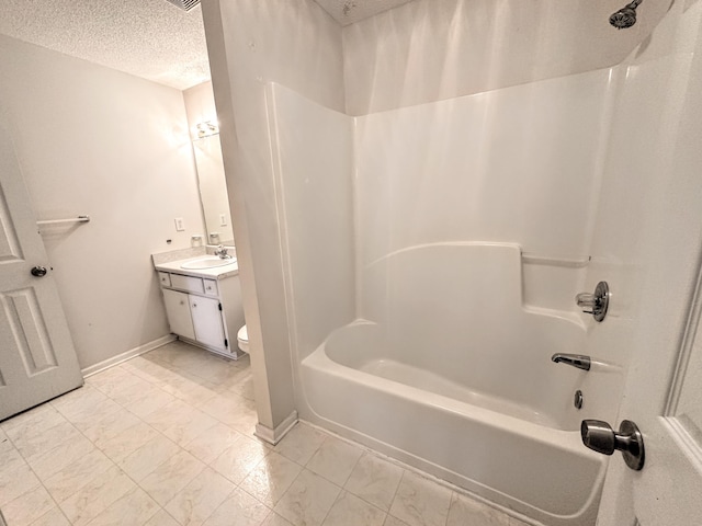 4917 Cavan Pl, Grovetown, GA 30813 - bathroom with marble look tile flooring, a textured ceiling, bathtub / shower combination, vanity, and toilet