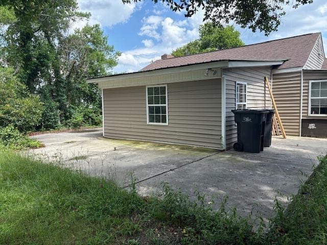 2009 Ryan Rd, Augusta, GA 30904 - view of side of property with a patio area and roof with shingles