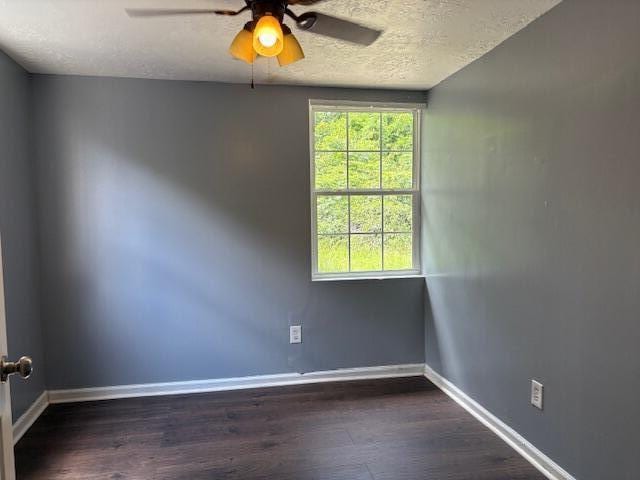 2009 Ryan Rd, Augusta, GA 30904 - unfurnished room with ceiling fan, dark wood-style flooring, and a textured ceiling