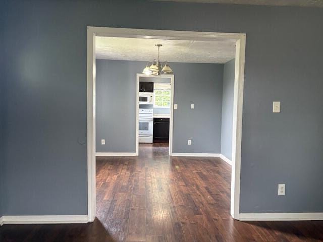 2009 Ryan Rd, Augusta, GA 30904 - unfurnished dining area with wood finished floors and a chandelier