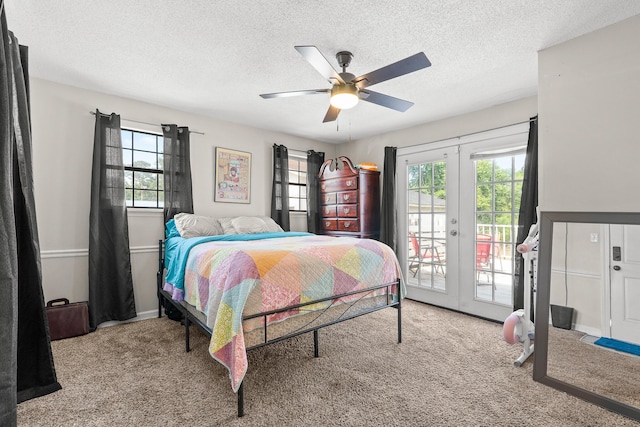 2144 Reedale Ave, Augusta, GA 30906 - carpeted bedroom with multiple windows, access to outside, french doors, and a textured ceiling