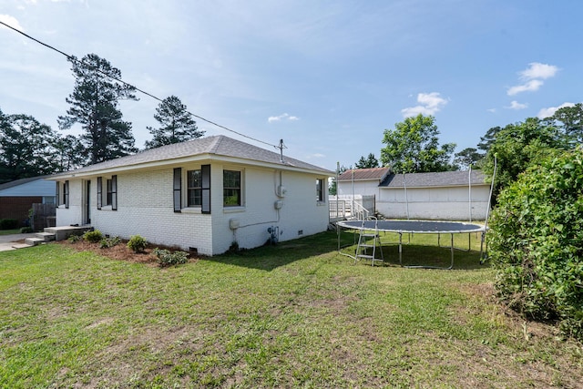 2144 Reedale Ave, Augusta, GA 30906 - view of side of property with a trampoline and brick siding