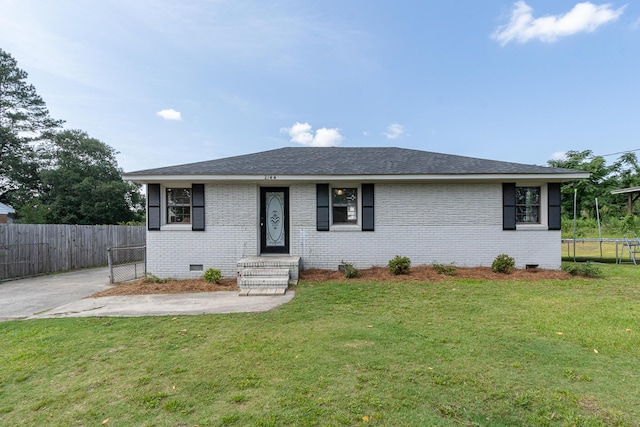 2144 Reedale Ave, Augusta, GA 30906 - view of front of home featuring a trampoline, crawl space, brick siding, and roof with shingles