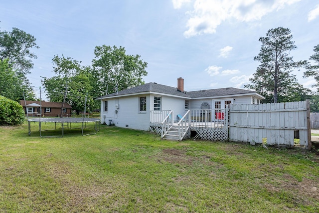 2144 Reedale Ave, Augusta, GA 30906 - rear view of property with a trampoline, a deck, and a chimney