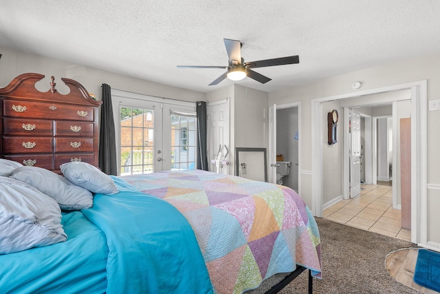 2144 Reedale Ave, Augusta, GA 30906 - bedroom with french doors, access to outside, tile patterned floors, a textured ceiling, and a ceiling fan