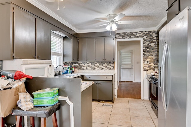 3840 Belair Rd, Augusta, GA 30909 - kitchen with stainless steel fridge with ice dispenser, ceiling fan, crown molding, tasteful backsplash, and light tile patterned floors