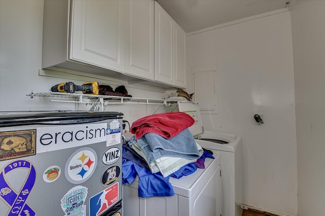 3840 Belair Rd, Augusta, GA 30909 - laundry room featuring washing machine and clothes dryer and cabinet space