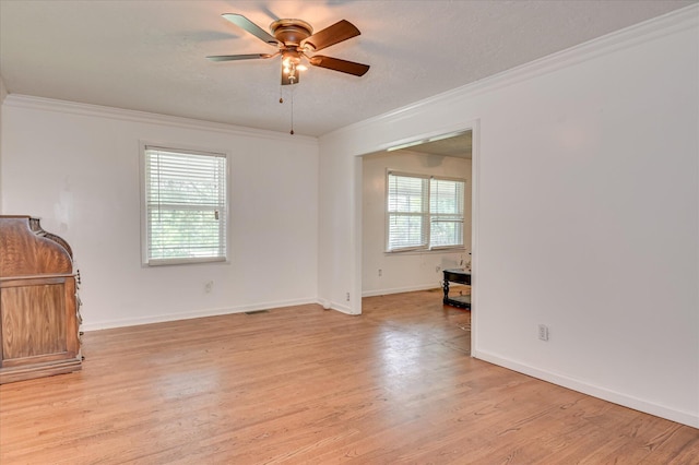3840 Belair Rd, Augusta, GA 30909 - unfurnished living room featuring crown molding, a ceiling fan, light wood finished floors, and a textured ceiling