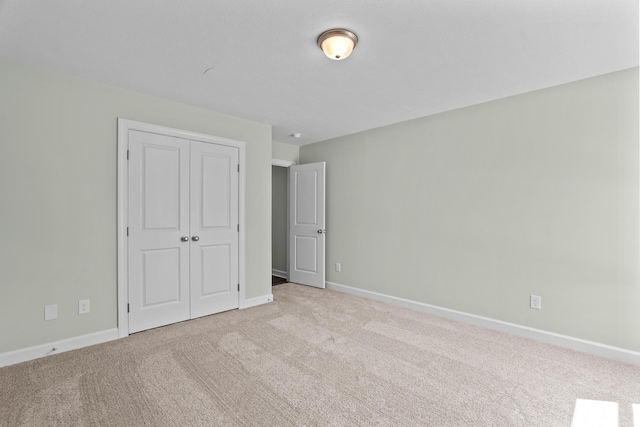 1355 Bellingham Dr, Beech Island, SC 29842 - unfurnished bedroom featuring baseboards, carpet flooring, and a closet