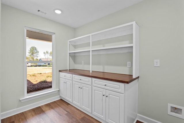1355 Bellingham Dr, Beech Island, SC 29842 - interior space featuring visible vents, baseboards, and dark wood-style floors
