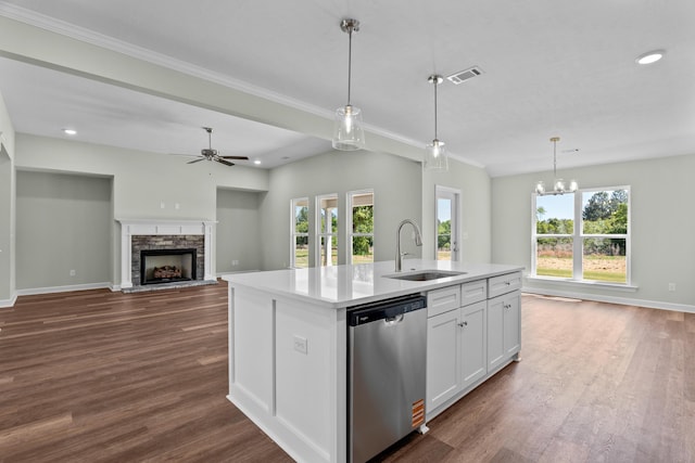 1355 Bellingham Dr, Beech Island, SC 29842 - kitchen with stainless steel dishwasher, a stone fireplace, a sink, ceiling fan with notable chandelier, and visible vents