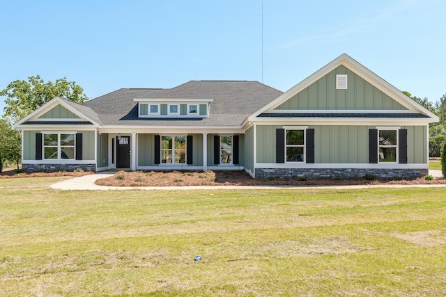 1355 Bellingham Dr, Beech Island, SC 29842 - view of front of home featuring board and batten siding, a front lawn, and roof with shingles