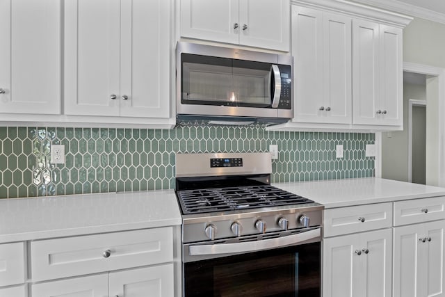 1355 Bellingham Dr, Beech Island, SC 29842 - kitchen featuring white cabinets, stainless steel appliances, light countertops, and tasteful backsplash