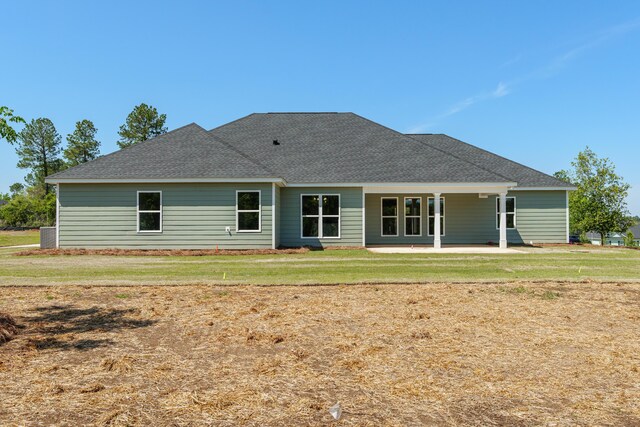 1355 Bellingham Dr, Beech Island, SC 29842 - back of property featuring roof with shingles, a yard, and a patio