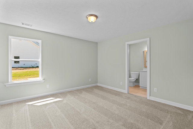 1355 Bellingham Dr, Beech Island, SC 29842 - spare room featuring carpet, visible vents, and baseboards
