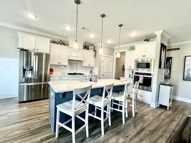 craftsman-style home featuring a front yard and a garage