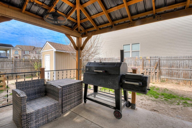 view of patio with a gazebo and a grill