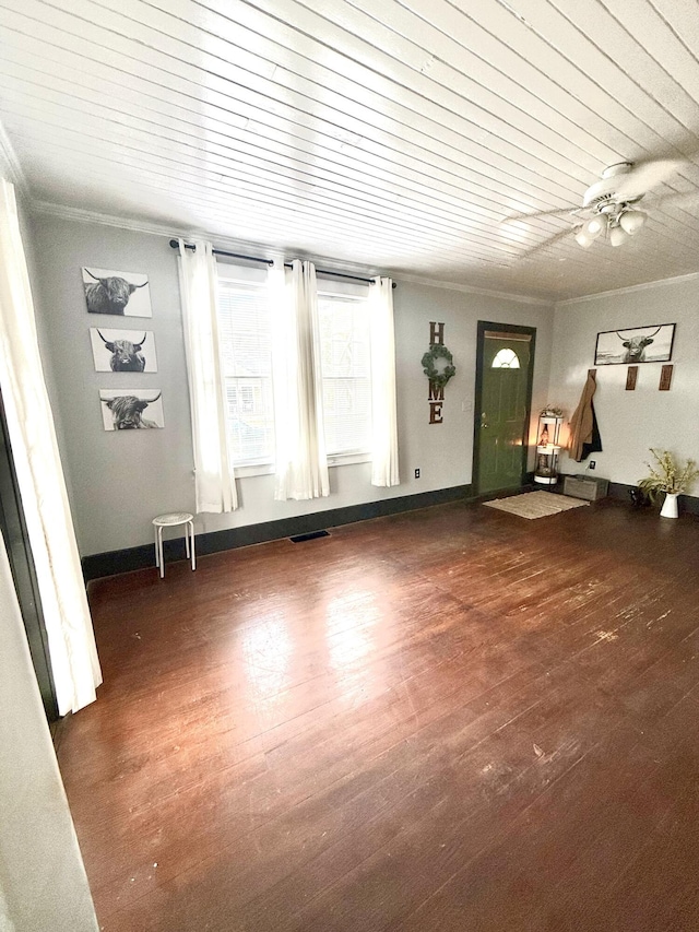 interior space with crown molding, wood ceiling, and dark hardwood / wood-style flooring