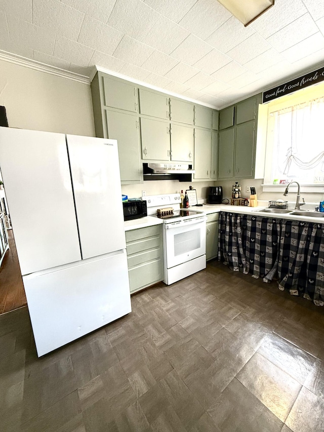 kitchen featuring crown molding, sink, green cabinets, and white appliances