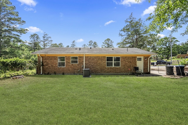 2954 Celeste Dr, Hephzibah, GA 30815 - rear view of property with brick siding and central AC
