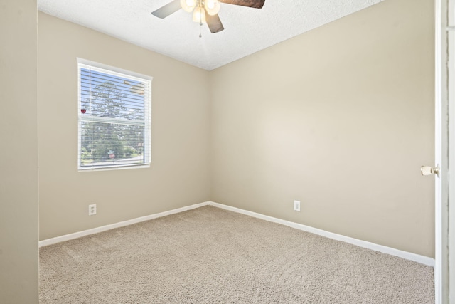 2954 Celeste Dr, Hephzibah, GA 30815 - carpeted spare room with ceiling fan, baseboards, and a textured ceiling