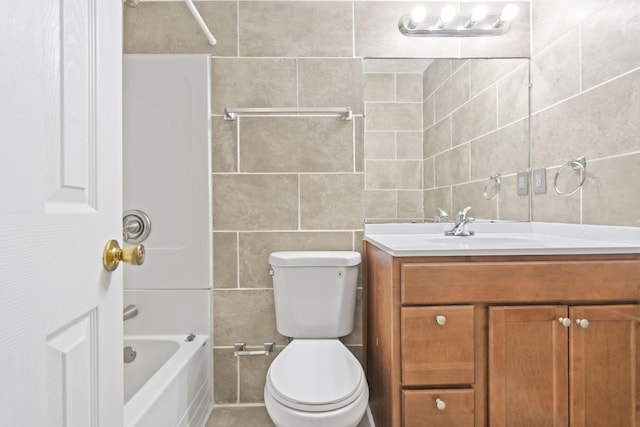 2954 Celeste Dr, Hephzibah, GA 30815 - full bathroom featuring tile walls, vanity, shower / bath combination, and toilet