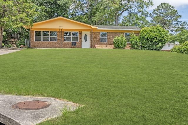 2954 Celeste Dr, Hephzibah, GA 30815 - ranch-style house featuring a front yard and brick siding