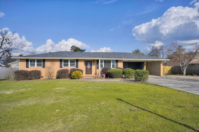 ranch-style home with a carport and a front lawn