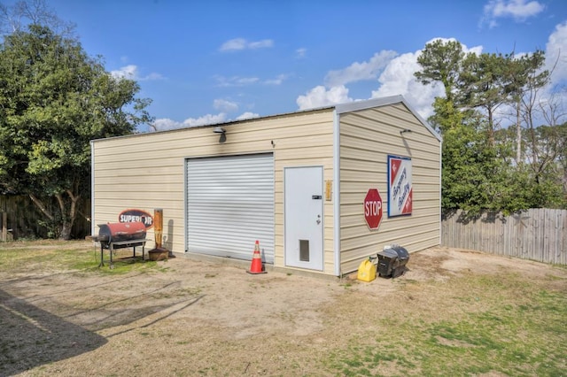 view of outdoor structure featuring a garage