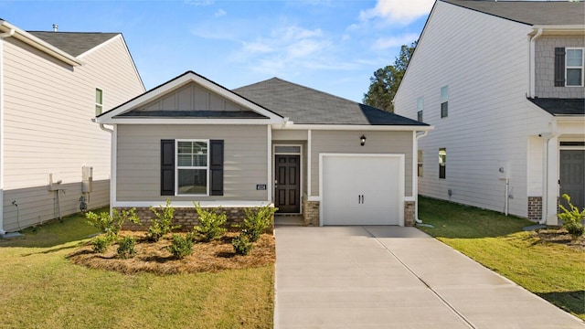 view of front facade with a front lawn and a garage