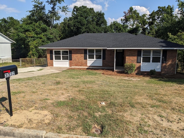 3332 Hillis Rd, Augusta, GA 30906 - single story home featuring brick siding, a shingled roof, and concrete driveway