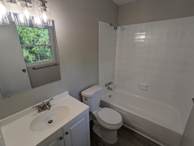 3332 Hillis Rd, Augusta, GA 30906 - bathroom featuring toilet, washtub / shower combination, vanity, and wood finished floors