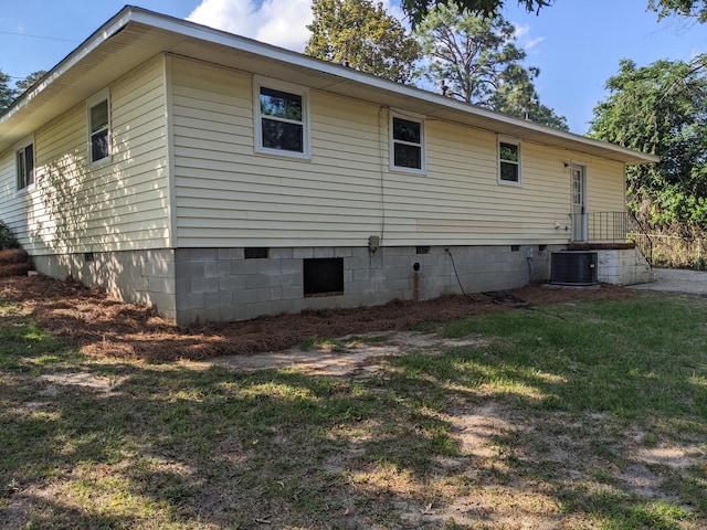 3332 Hillis Rd, Augusta, GA 30906 - rear view of house with crawl space, a lawn, and central AC
