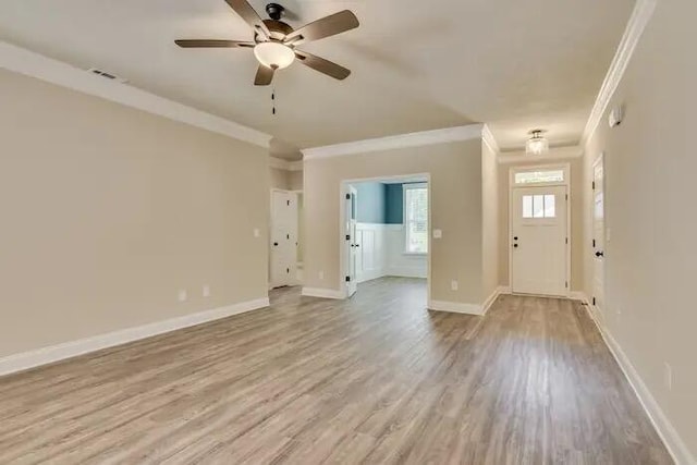 1068 Burlington Dr, Augusta, GA 30909 - unfurnished living room with ornamental molding, wood finished floors, a ceiling fan, and baseboards