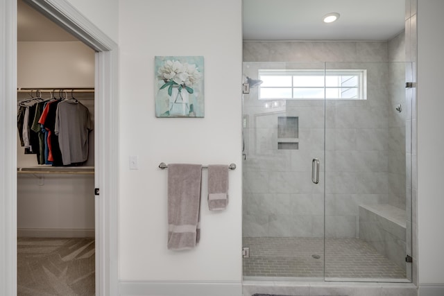 210 Rivernorth Dr, North Augusta, SC 29841 - bathroom featuring a shower stall, a walk in closet, and recessed lighting