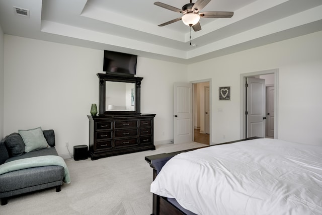 210 Rivernorth Dr, North Augusta, SC 29841 - carpeted bedroom with a tray ceiling and a ceiling fan