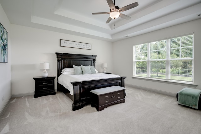 210 Rivernorth Dr, North Augusta, SC 29841 - bedroom featuring a raised ceiling, light colored carpet, and ceiling fan